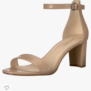 Size 10 nude strap heel brand new, never worn